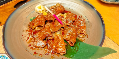 Wagyu Kobe beef in teppanyaki Japanese style cooking in restaurant