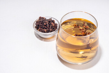 Clove Water or Tea, organic infused drink. Ayurvedic, antiseptic, anti-inflammatory and antioxidant...