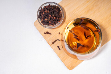 Clove Water or Tea, organic infused drink. Ayurvedic, antiseptic, anti-inflammatory and antioxidant...