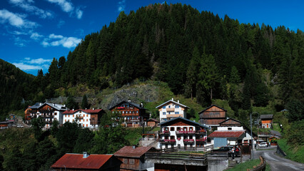 Fototapeta premium View of the Zoppe di Cadore commune at the foot of the majestic Mount Pelmo, province of Belluno in Veneto, Dolomites area, Italy. 