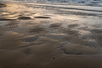 wet beach and the wave
