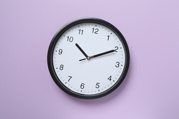 Big beautiful stylish clock on color background