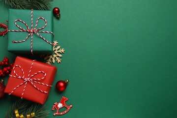 Beautiful gift boxes and Christmas decorations on color background 