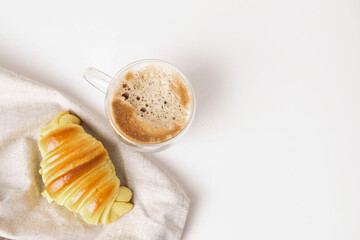 Cup of latte on light background