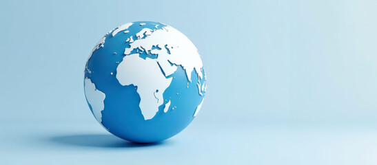 Naklejka premium Blue and white globe depicting continents on light blue background