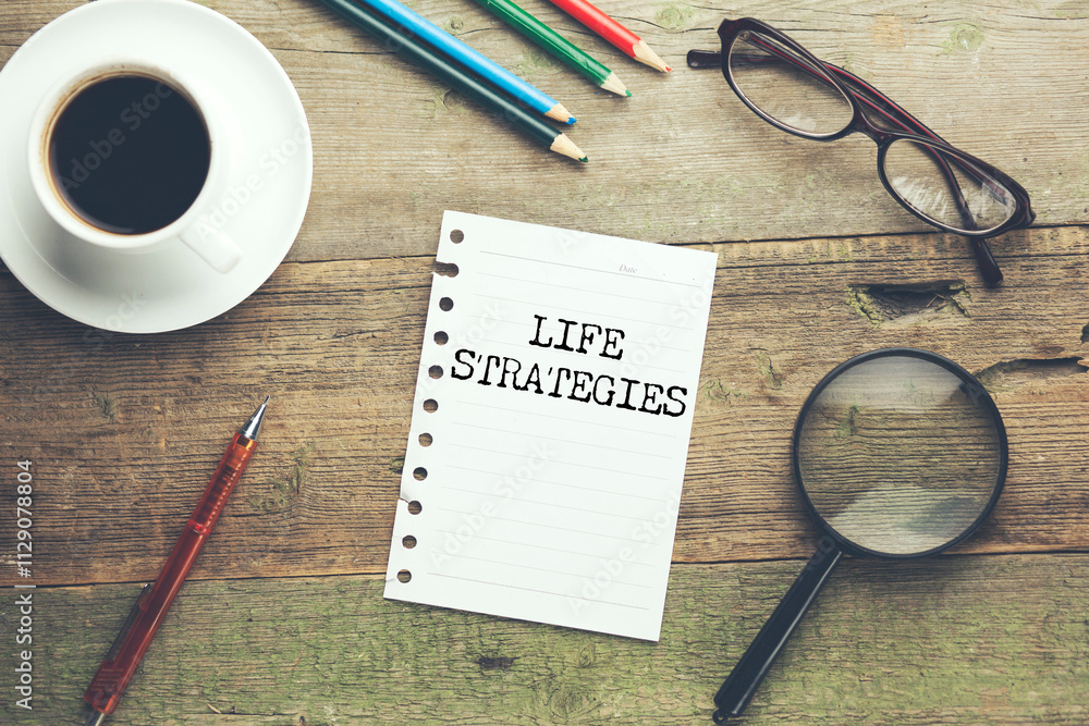 Poster life strategies text on notepad