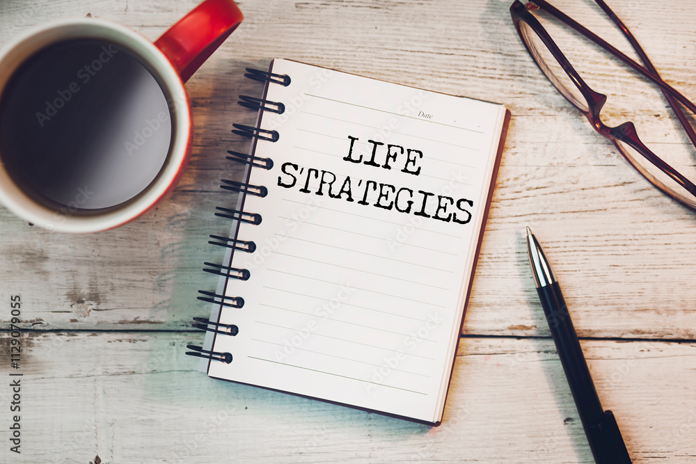 Poster life strategies text on notepad