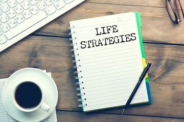 Life Strategy - handwritten text in a notebook
