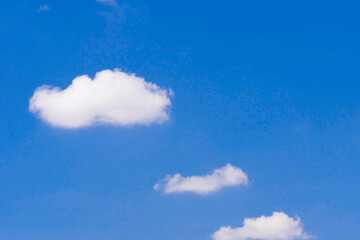 The sky is clear blue with some clouds.