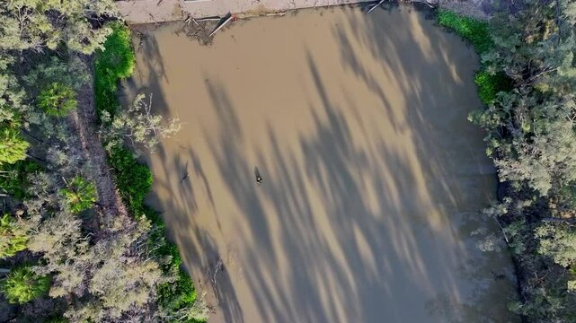 4K video, Dawson river weir, Theodore, central Queensland outback Australia, running water floodgate overflow