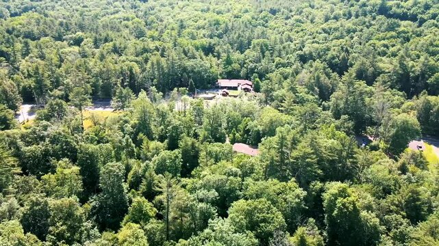 Aerial footage of the Pocono Mountains in Pennsylvania, USA. Stunning views of lush valleys, rolling hills, and natural landscapes, ideal for tourism, nature, adventure, and travel themes