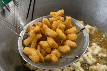 Chinese bread stick or chinese donut.