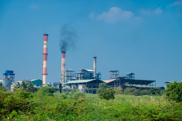 sugar mill, sugar factory in India, A sugar cane mill is a factory that processes sugar cane to produce raw sugar or plantation white sugar. Increasing air pollution to factory smoke.