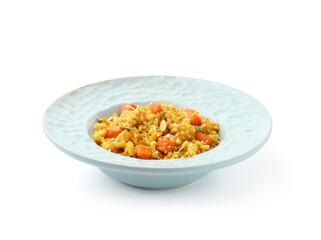 Delicious pumpkin risotto in bowl isolated on white