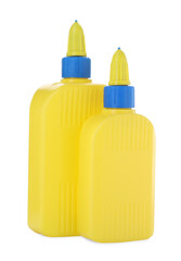 Bottles of glue with caps isolated on white