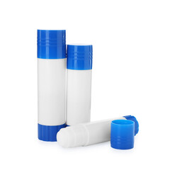 Many different glue sticks isolated on white
