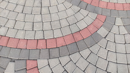 Fototapeta premium red brick pavement, brick wall, brick paving block for footpath.Red brick walkway. Street floor tiles. Brick blocks for background, texture of brick road for background