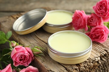 Natural solid perfume and pink roses on wood, closeup