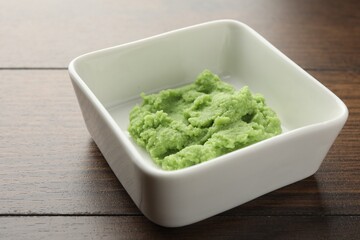 Hot wasabi paste on wooden table, closeup