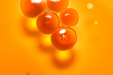 Close-up of orange bubbles with a dreamy, abstract effect.