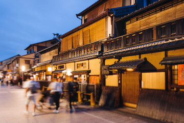 View of Gion district street, Kyoto, Higashiyama-ku, Japan, night illumination of Ninnenzaka and Sannenzaka streets, with old wooden tea houses Hokanji temple and Yasaka Pagoda, Gion geisha quarter