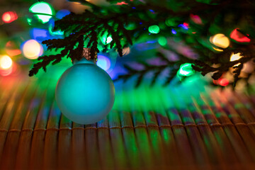 Blue Christmas Bauble and Lights on Fir Branch, Festive Close-Up