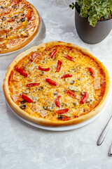 traditional Italian pizza on a white plate