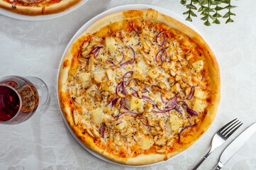 traditional Italian pizza on a white plate
