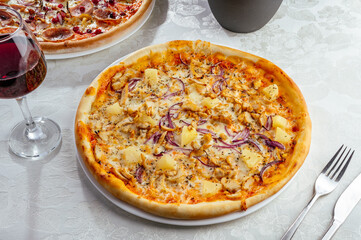 traditional Italian pizza on a white plate