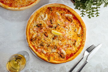 traditional Italian pizza on a white plate