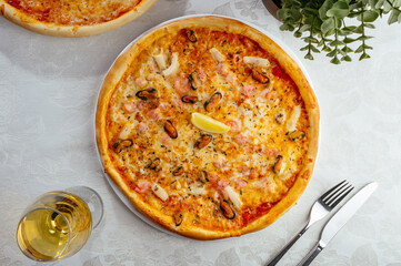 traditional Italian pizza on a white plate