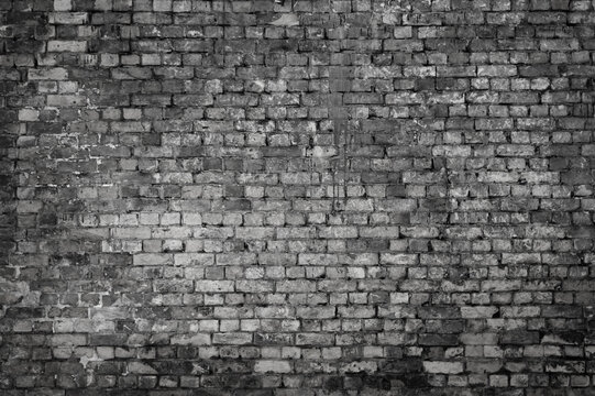 Fototapeta The photo shows a close-up of a grey brick wall
