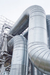 close-up of pipeline against grey sky
