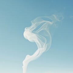 delicate wisps of smoke against a clear blue sky