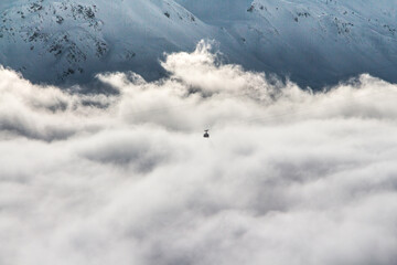 Cable car in St. Anton am Arlberg, Austria, above the clouds