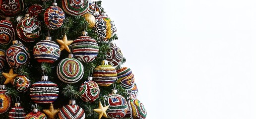 christmas tree colorful ndebele inspired with geometric patterns and traditional african tribal art decorations on light background