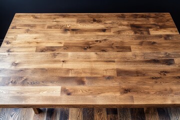 Overhead view of a rustic, dark brown wood table top.