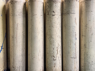 Gas cylinders used for industrial purposes.