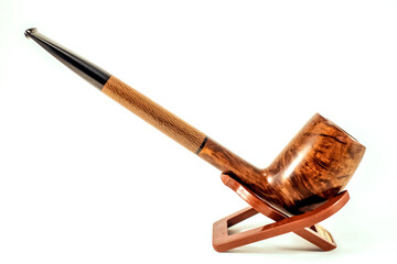 Elegant wooden tobacco pipe isolates. Close up