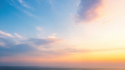 Beautiful Sunset Over Calm Ocean Waters with a Gradient Sky Transitioning from Blue to Warm Orange and Pink Hues, Perfect for Nature Lovers and Tranquil Scenery Enthusiasts