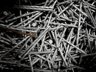 a pile of nails for reuse and recycling