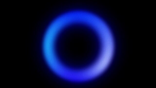 looped abstract grainy blue gradient glowing pulsating ring on black background