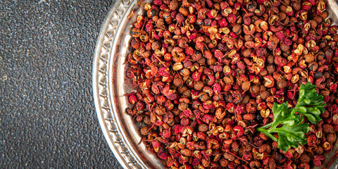 Sichuan pepper spice pepper peas fresh tasty food gourmet food background on the table rustic food top view copy space
