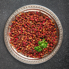 Sichuan pepper spice pepper peas fresh tasty food gourmet food background on the table rustic food top view copy space