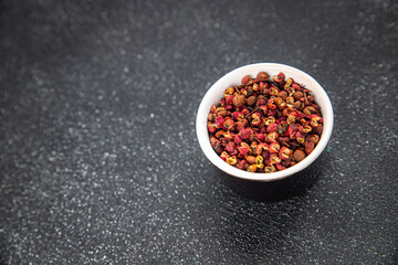 Sichuan pepper spice pepper peas fresh tasty food gourmet food background on the table rustic food top view copy space
