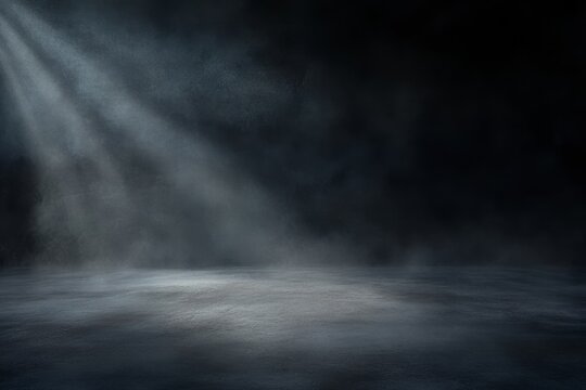 Dark studio background with spotlight and fog.