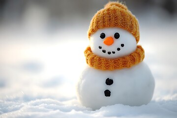 Obraz premium A cute snowman wearing a knitted orange hat and scarf stands in the fresh snow, bringing winter joy.