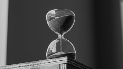 hourglass on black background