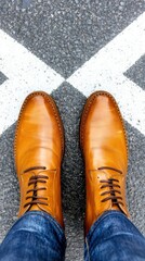 Brown leather shoes stand on a textured asphalt surface with a white X marking, AI