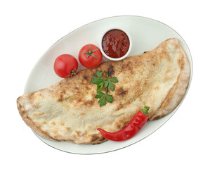 Delicious calzone with ketchup, fresh tomatoes and chili pepper isolated on white, top view